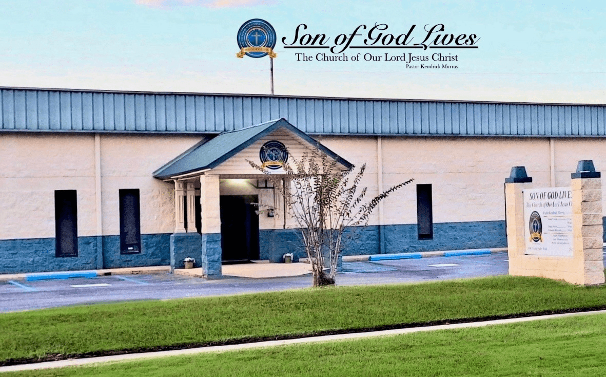 Exterior view of the Son of God Lives church, featuring a welcoming entrance and sign detailing its name and pastor, set against a grassy landscape.
